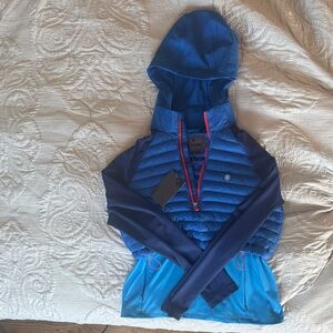 G/FORE Vibrant Blue Puffer Jacket with Red Zipper